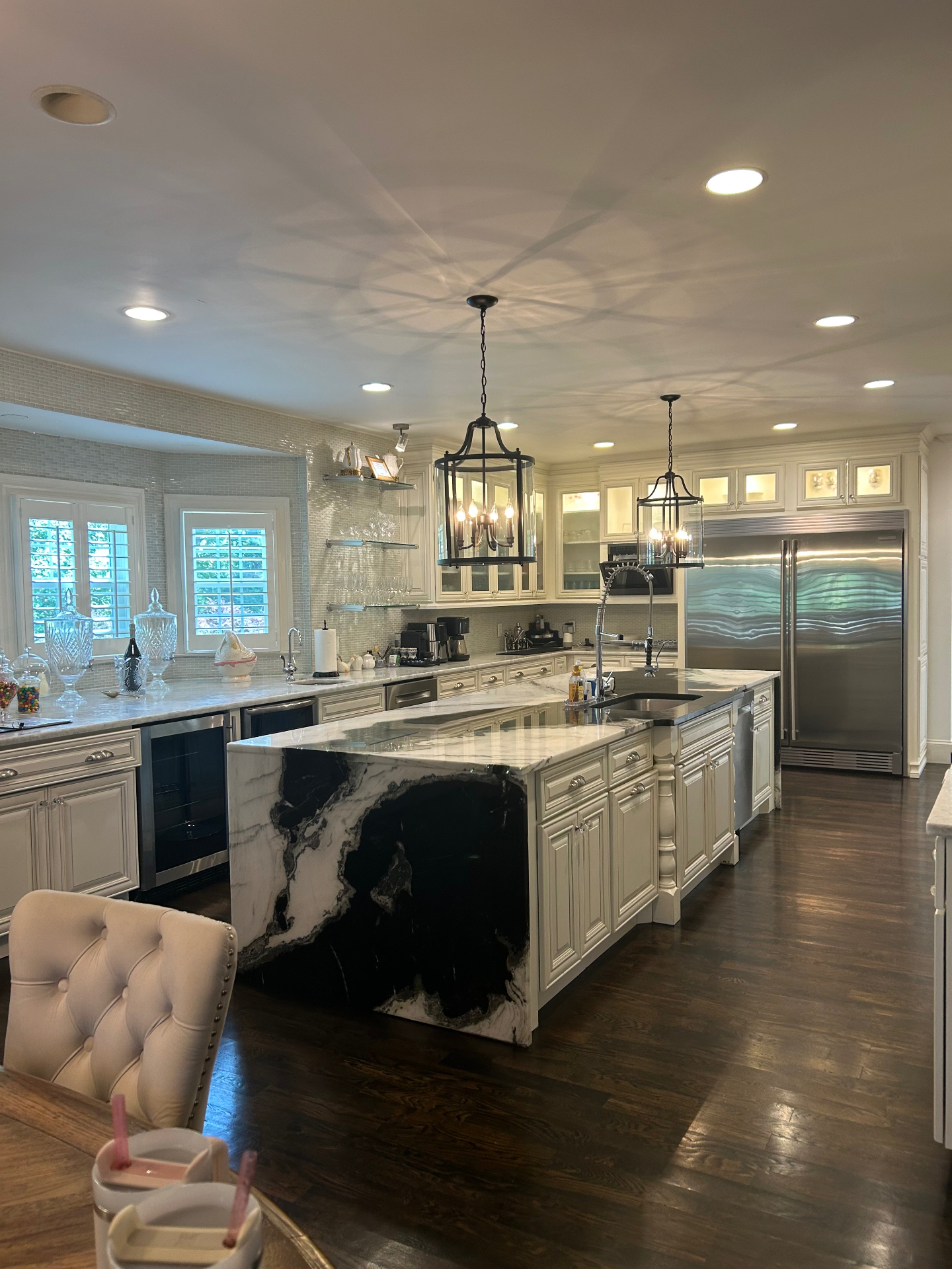Freshly cleaned kitchen with marble island